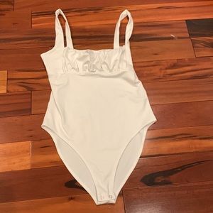 Womens small white body suit from Forever 21.